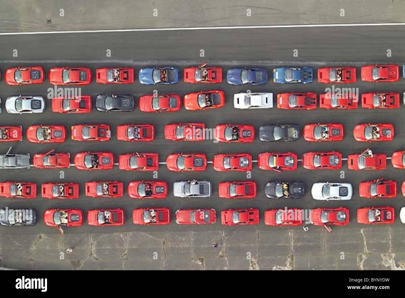 * FERRARI RACES INTO THE RECORD BOOKS Car giant Ferrari has powered