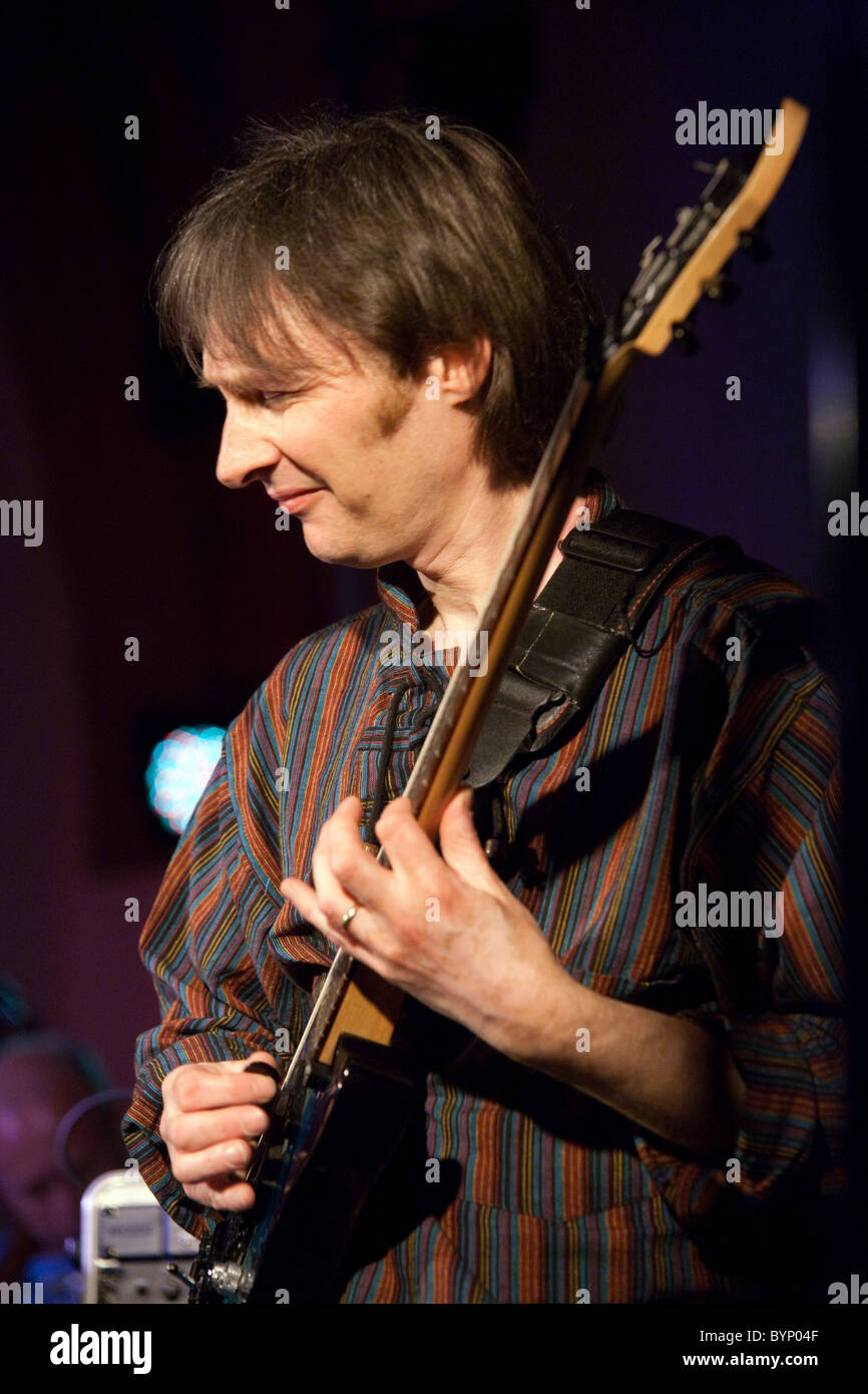 Dave Bainbridge, lead guitarist with the celtic rock band Iona, playing on stage In UK, May 2010 Stock Photo