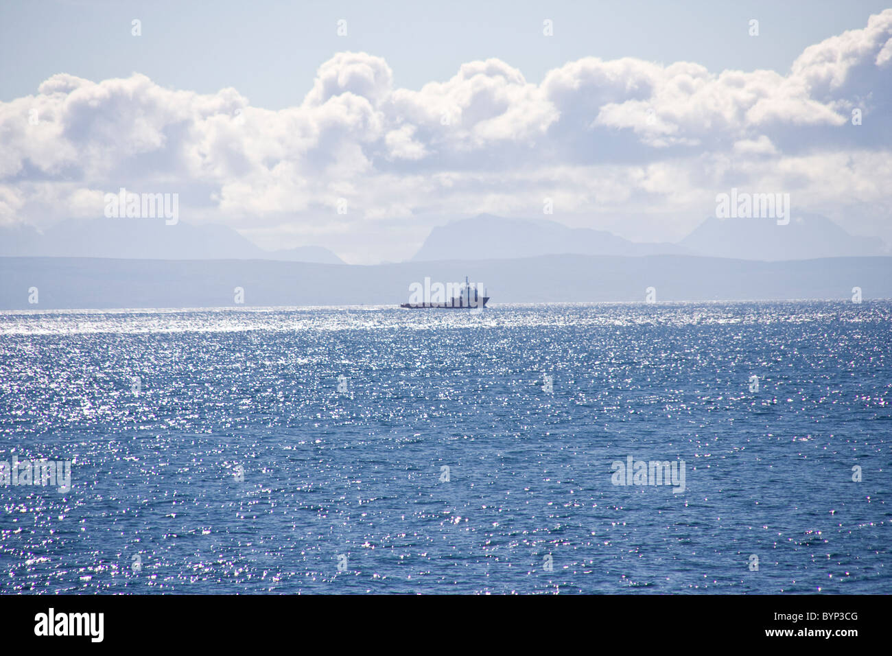 Distant ship and the Isle of Skye from the Minch, Scotland Stock Photo