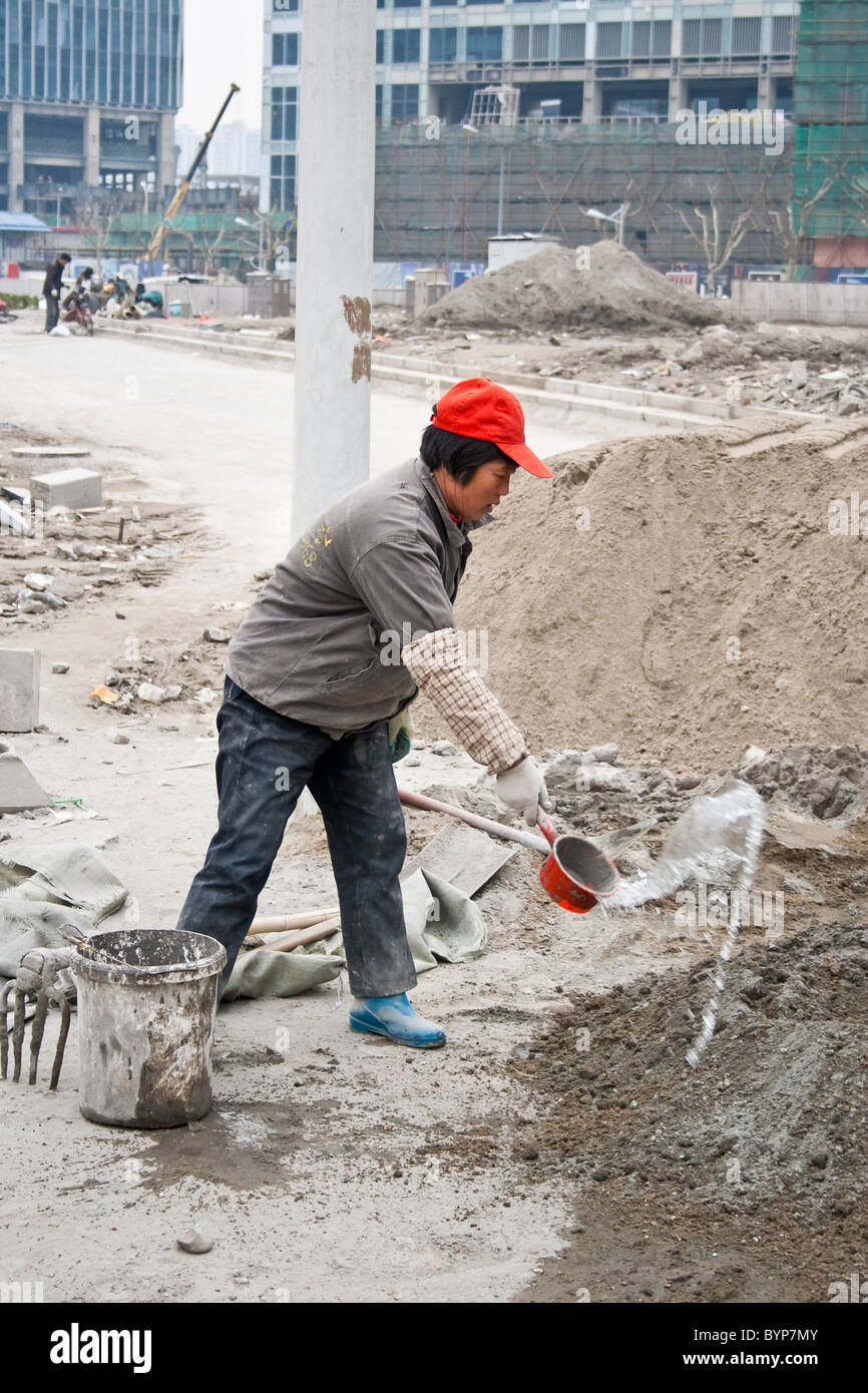 Female laborer at a construction site in Shanghai, China Stock Photo