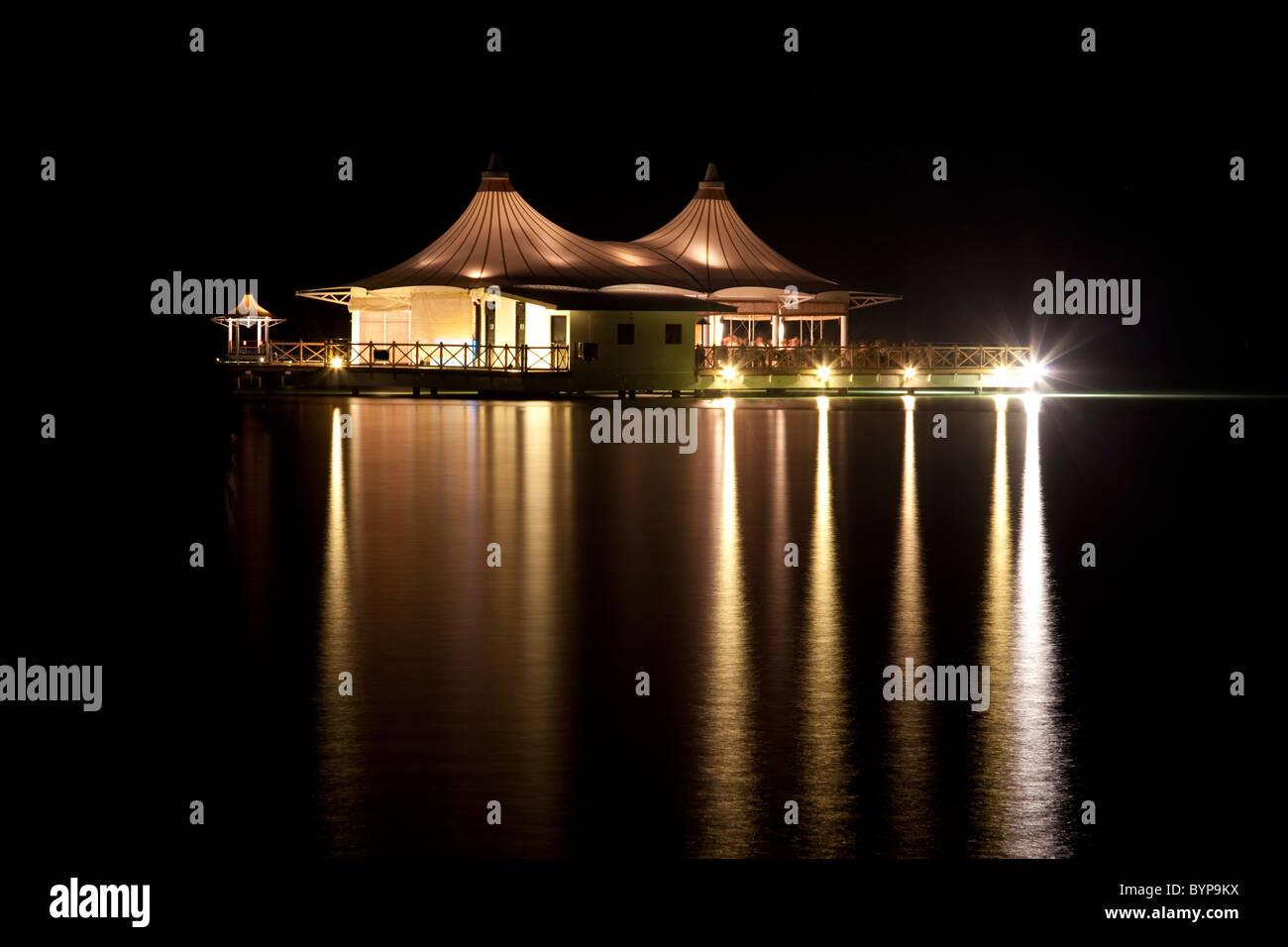Bar reflected at night in the Maldives Stock Photo