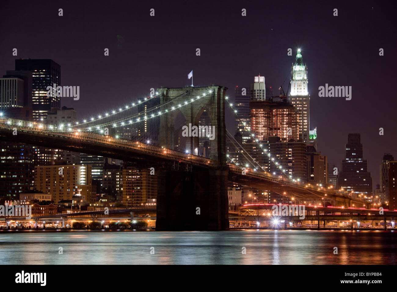 Usa New York Brooklyn Brooklyn Bridge At Night Reflected In East Stock Photo Alamy