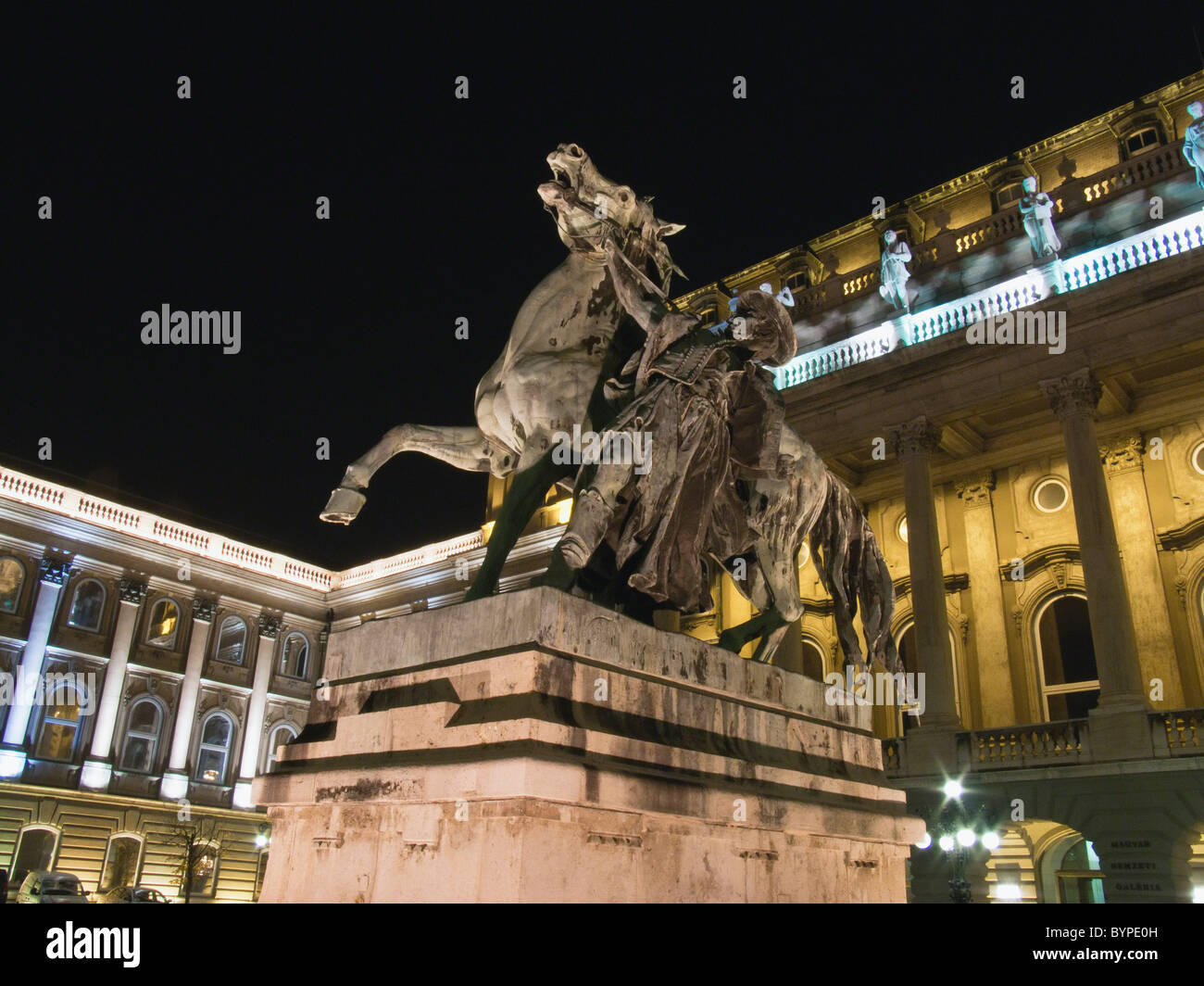 Csikos Statue at Night, Royal Palace, Budapest, Hungary Stock Photo