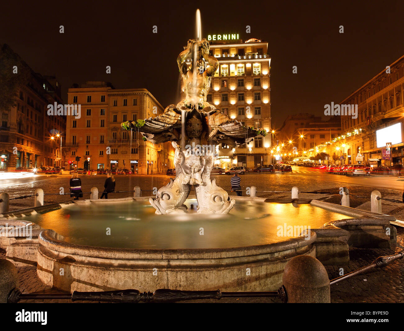 The Triton Fountain at Night, Piazza Bernini, Rome, Italy Stock Photo