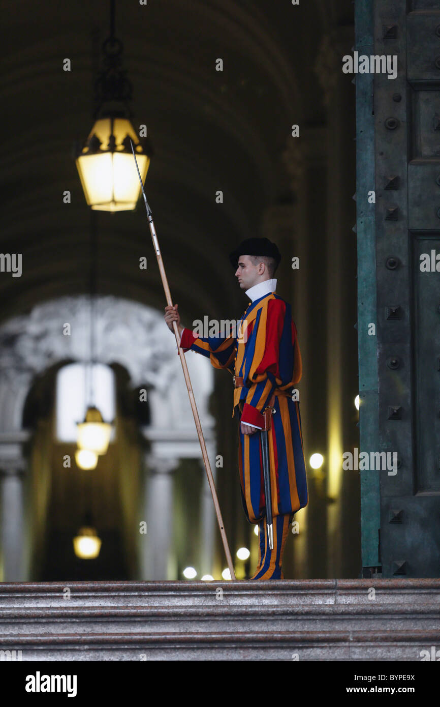 Papal Swiss Guard Guarding The Bronze Door of the St Peter's Basilica