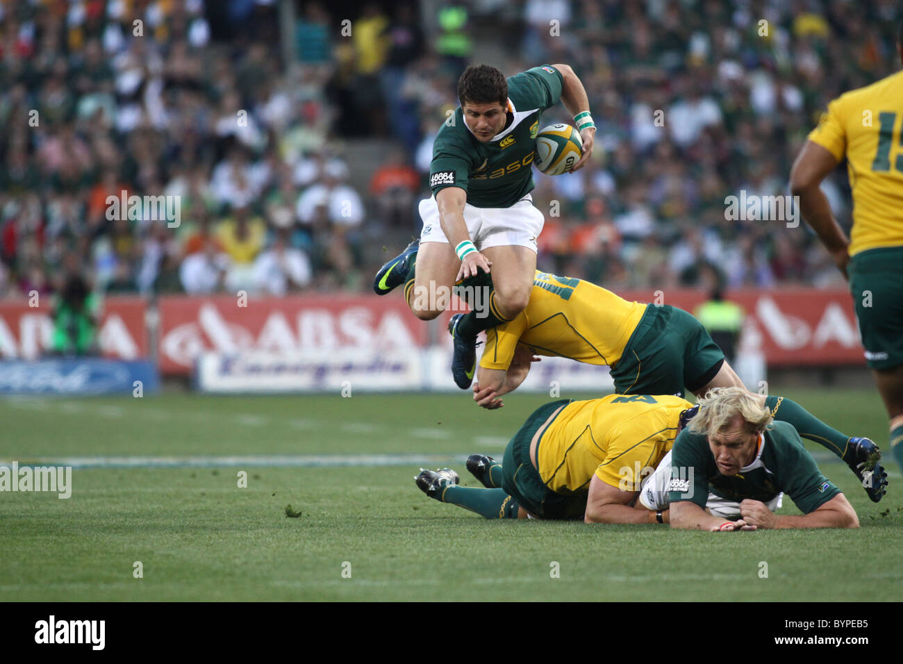 Morne Steyn Evades a tackle by going over the Australian defence Stock Photo