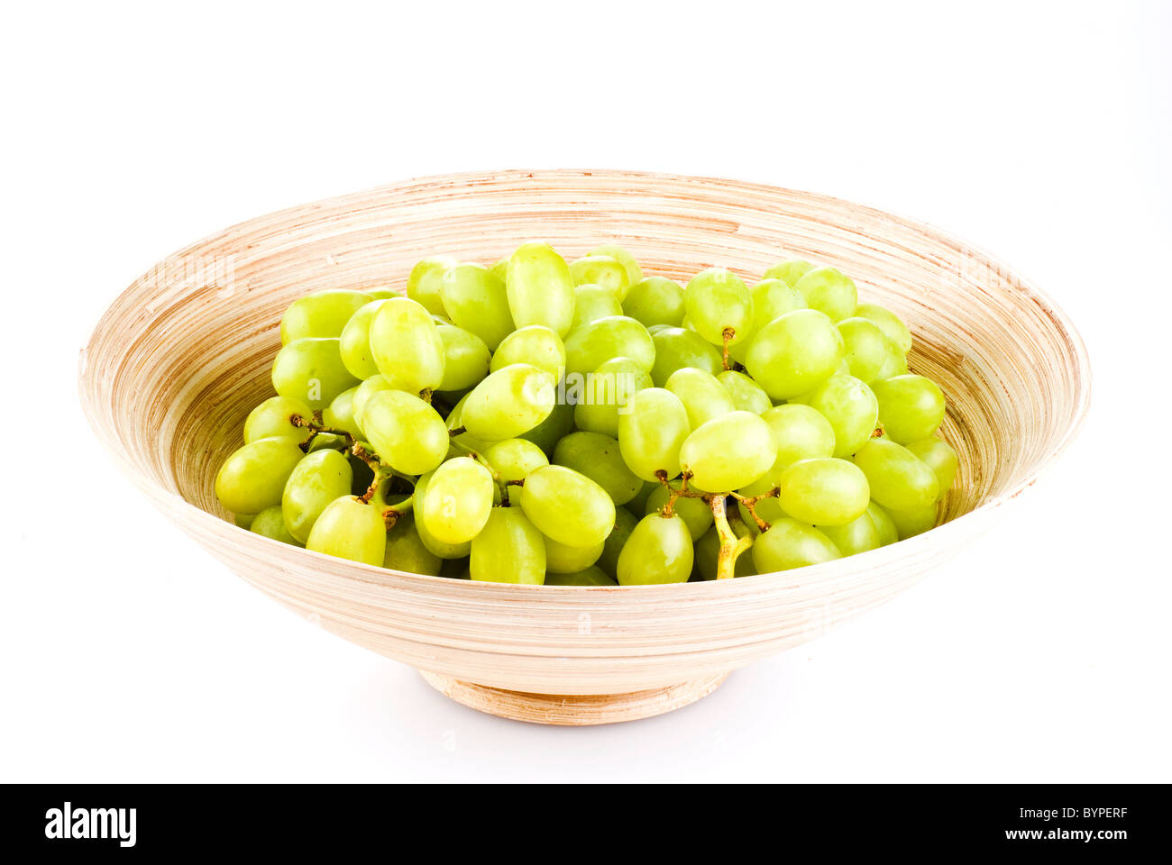https://c8.alamy.com/comp/BYPERF/grape-fruits-in-wooden-bowl-isolated-over-white-BYPERF.jpg