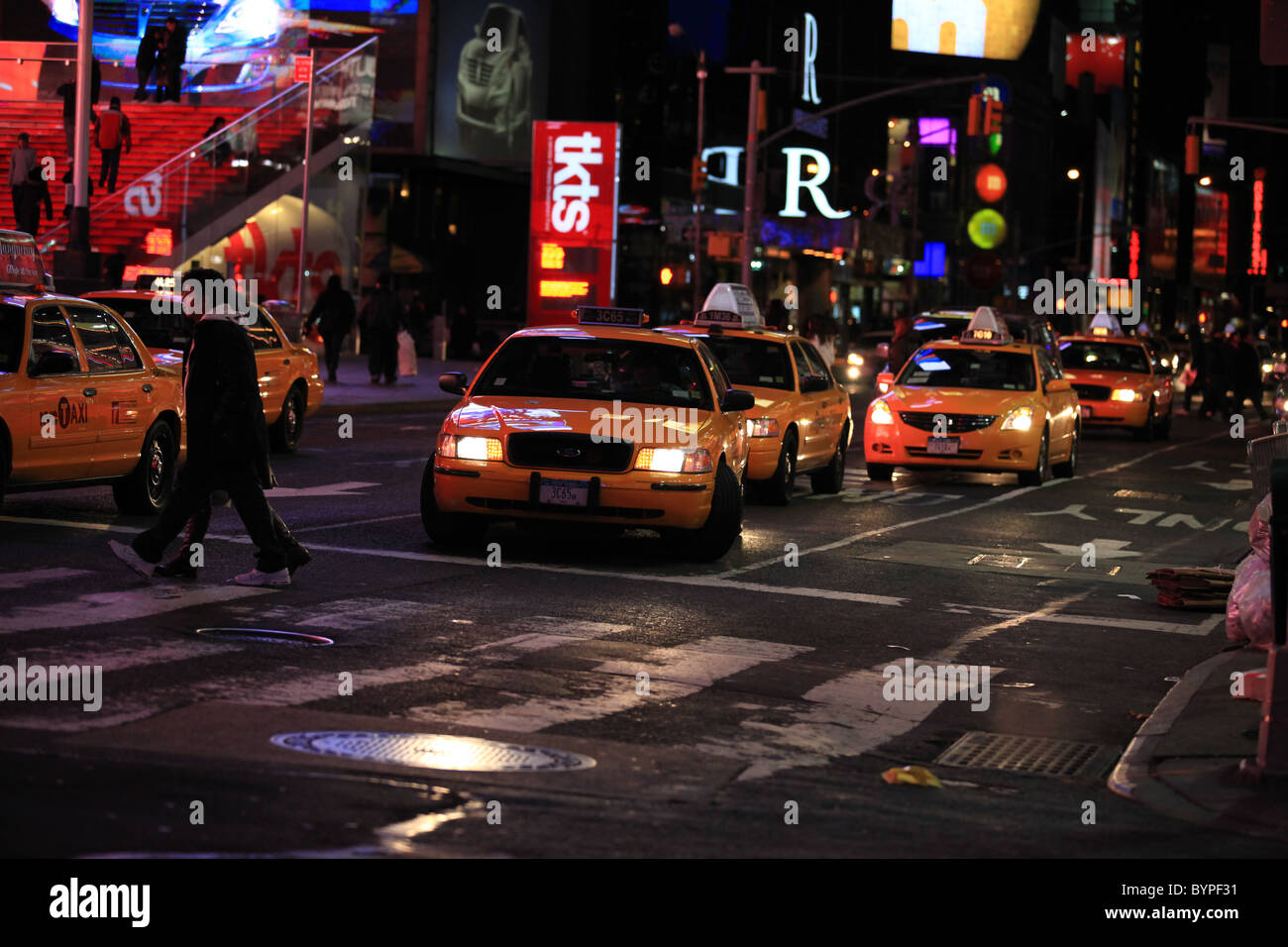 New York taxis crowded at Times square, New York city, in Christmas night 2010 Stock Photo
