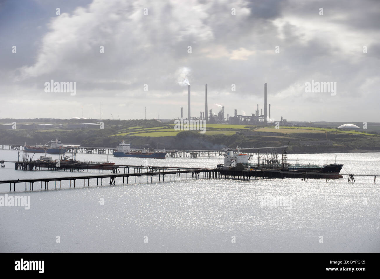 View from Milford Haven across the bay to the oil refinery at Rhoscrowther, Wales UK Stock Photo