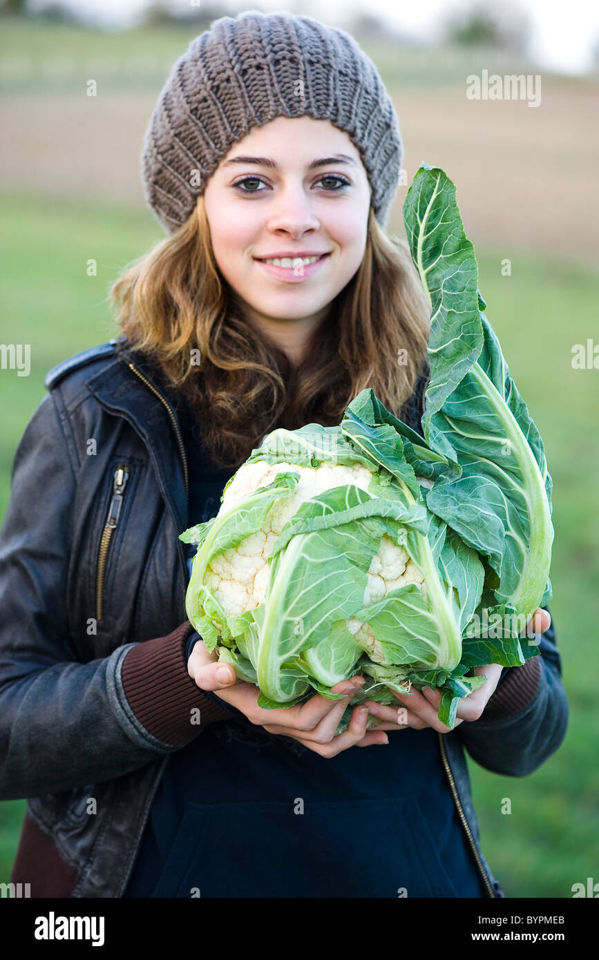 Holding fresh cauliflower Stock Photo Alamy