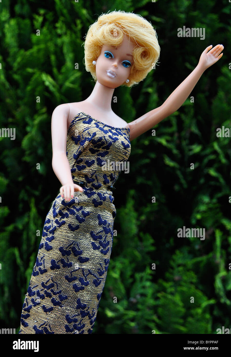 Vintage 1963 golden blond Barbie doll wearing Lame sheath in blue and gold, 1963 Stock Photo