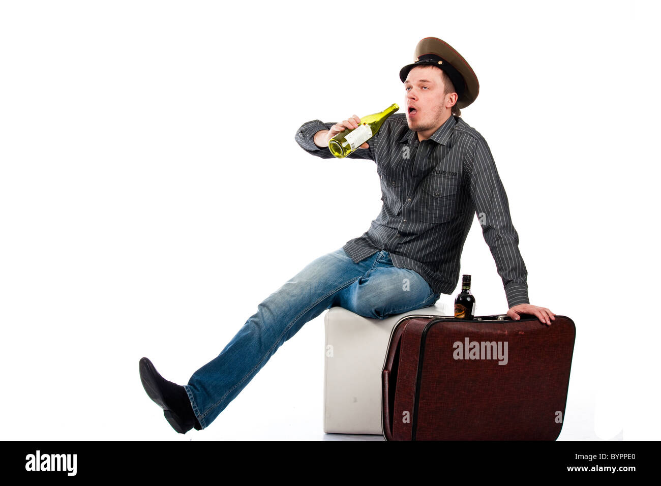 Portrait of a drunk man with a bottle isolated on white Stock Photo