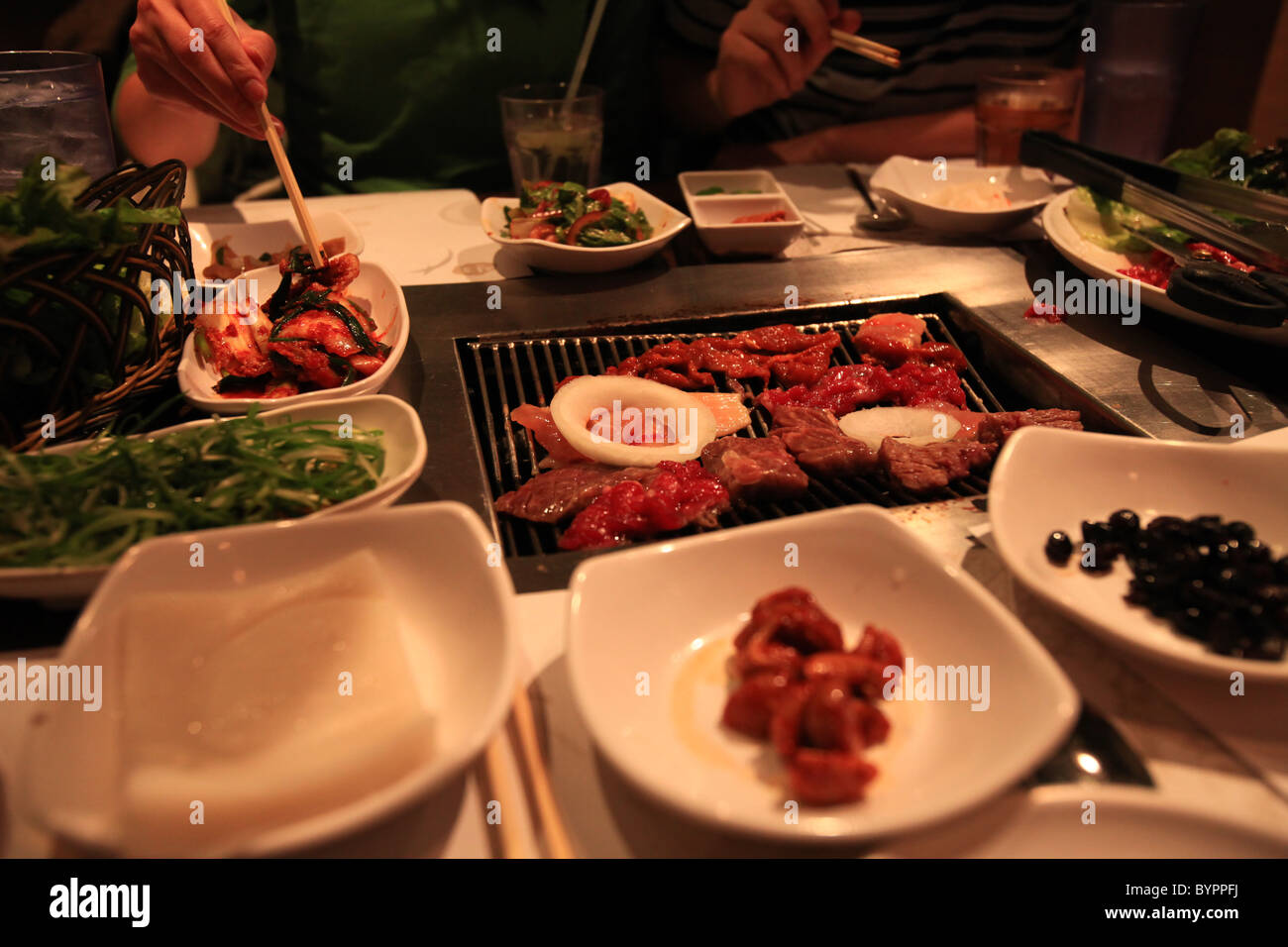 BBQ meats in a Korean restaurant in New York city Stock Photo Alamy