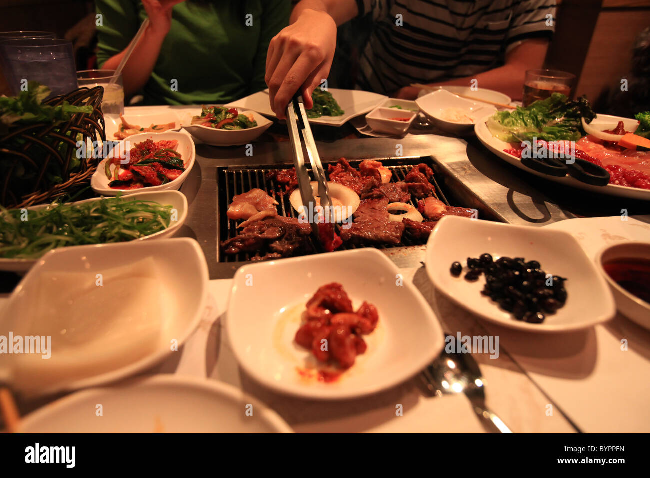 BBQ meats in a Korean restaurant in New York city Stock Photo Alamy