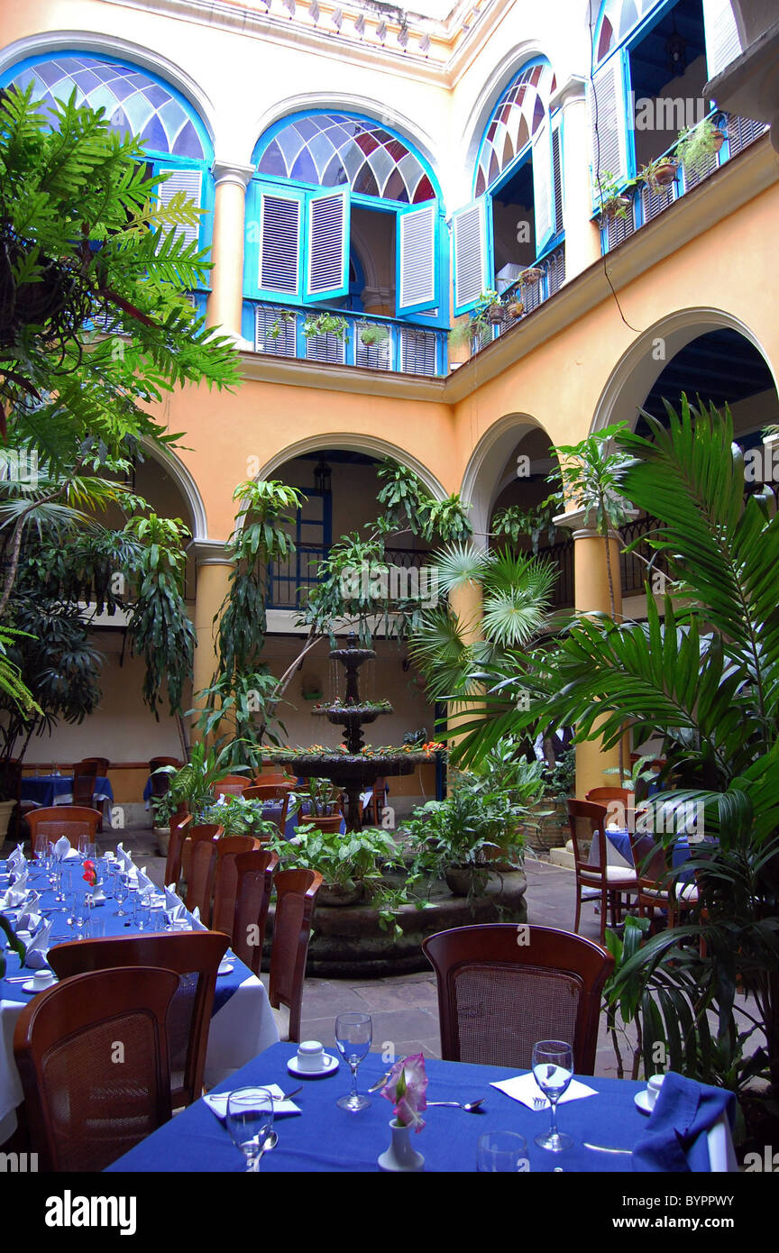 table settings in courtyard restaurant Stock Photo