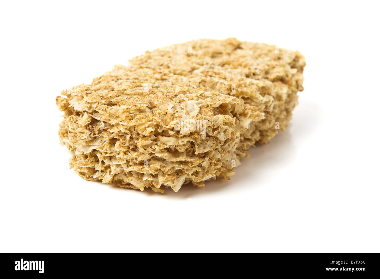 Breakfast Biscuit made from whole wheat isolated on white. Stock Photo