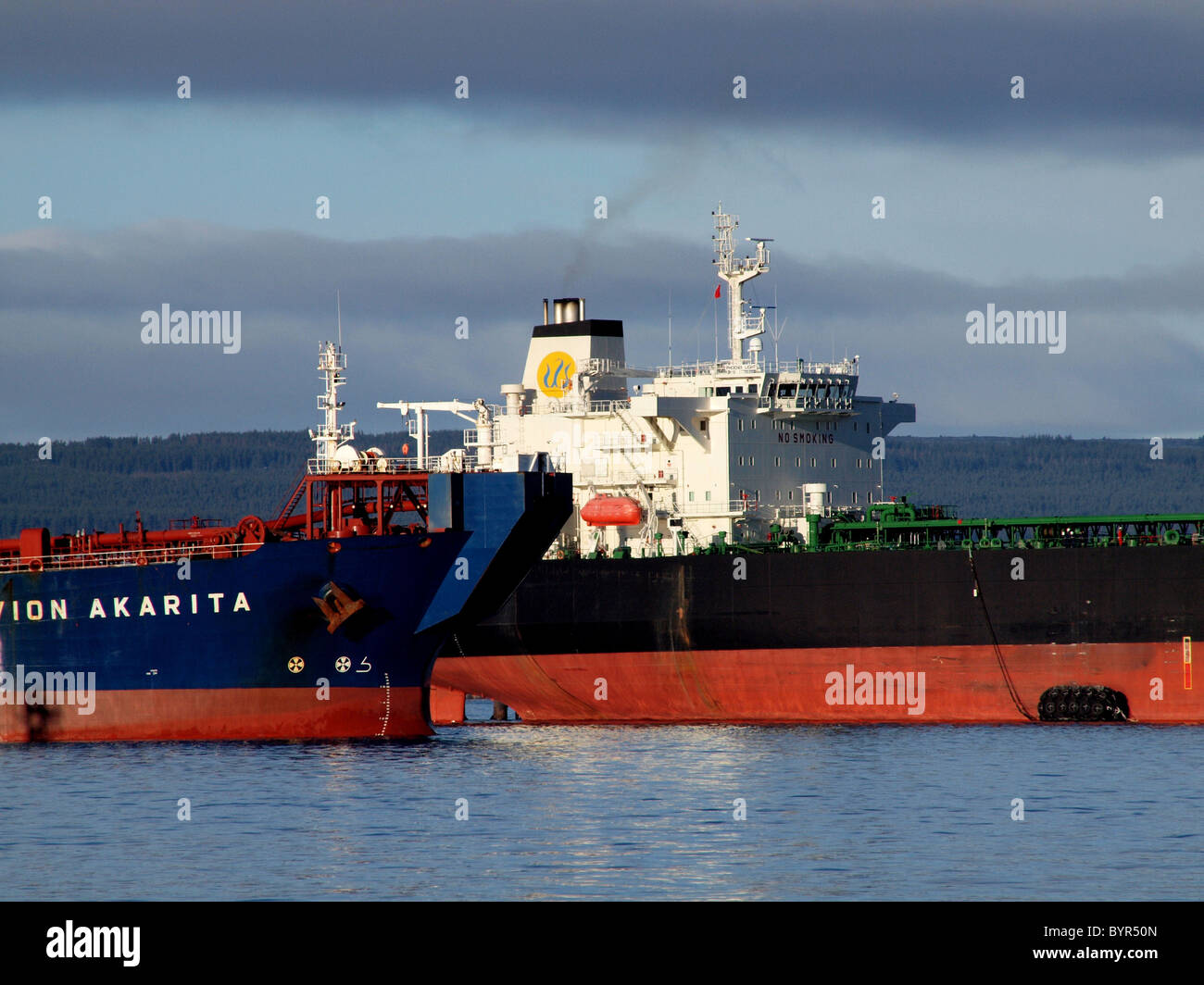Two tankers in the Cromarty Firth, Scotland, at the Nigg Oil Terminal Stock Photo