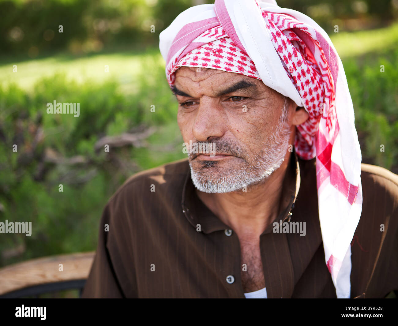 Portrait of Syrian man in traditional headscarf, Hama, Syria Stock Photo