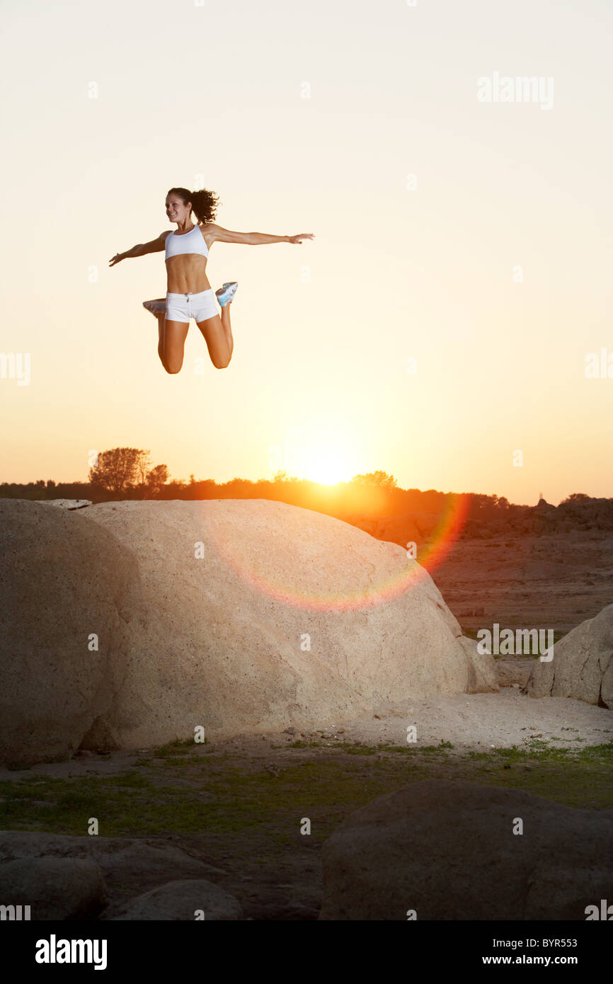 Woman jumps lake hi-res stock photography and images - Alamy