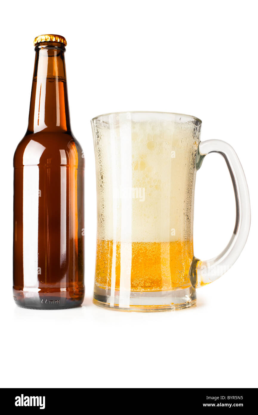 Bottle full of beer and mug with fresh beer and foam on white background Stock Photo