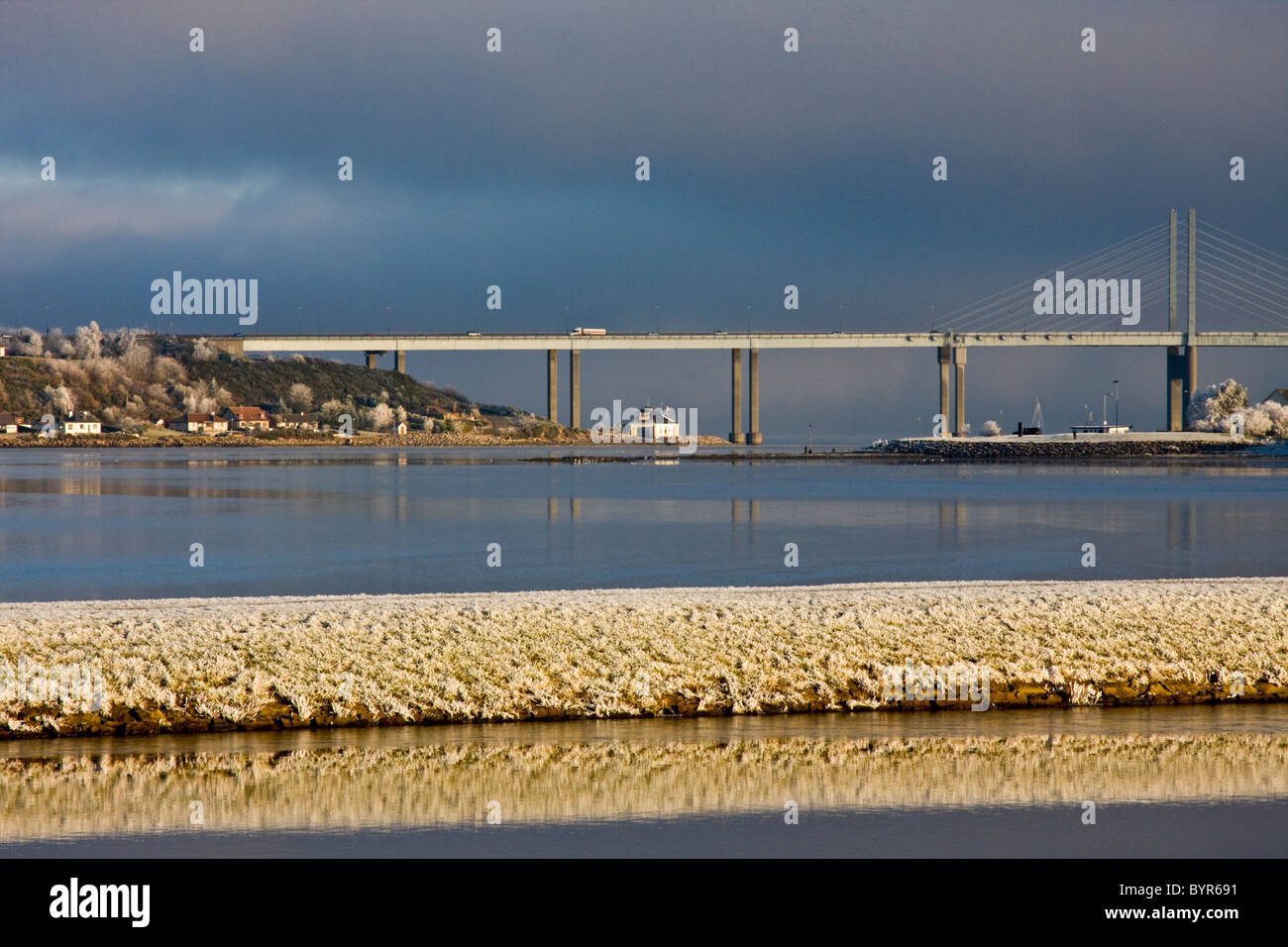 Very frosty Kessock Bridge near Inverness, from the Caledonian Canal at the Clachnaharry Sea Lock. Stock Photo