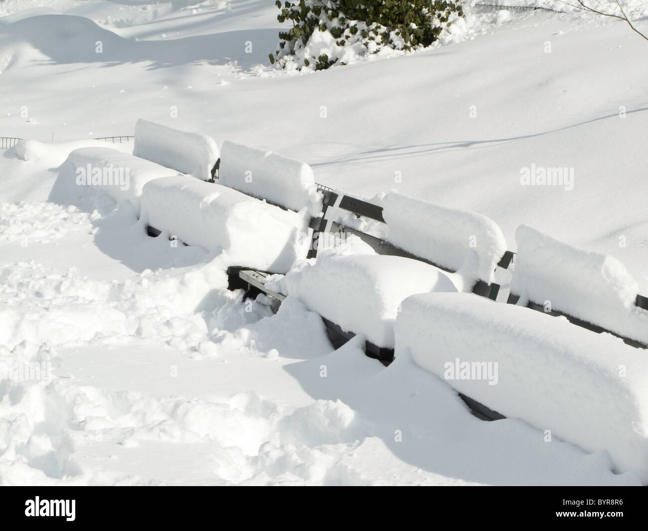 Snow Covered Park Benches, Central Park, NYC Stock Photo