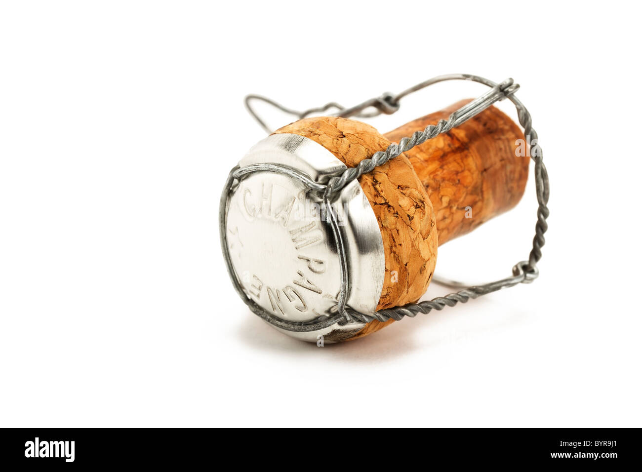 lying cork from a champagne bottle on white background Stock Photo Alamy