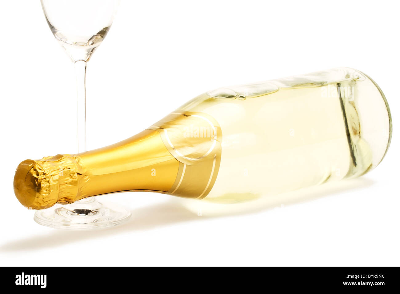 Lying Champagne Bottle With A Empty Champagne Glass On White Background Stock Photo Alamy