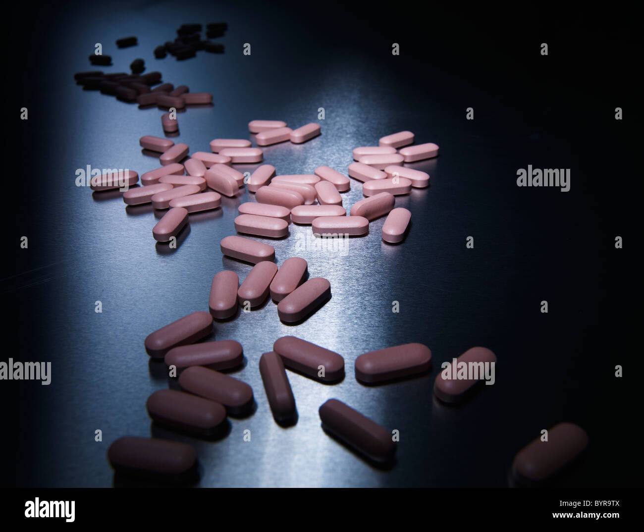 pink pills on aluminium Stock Photo