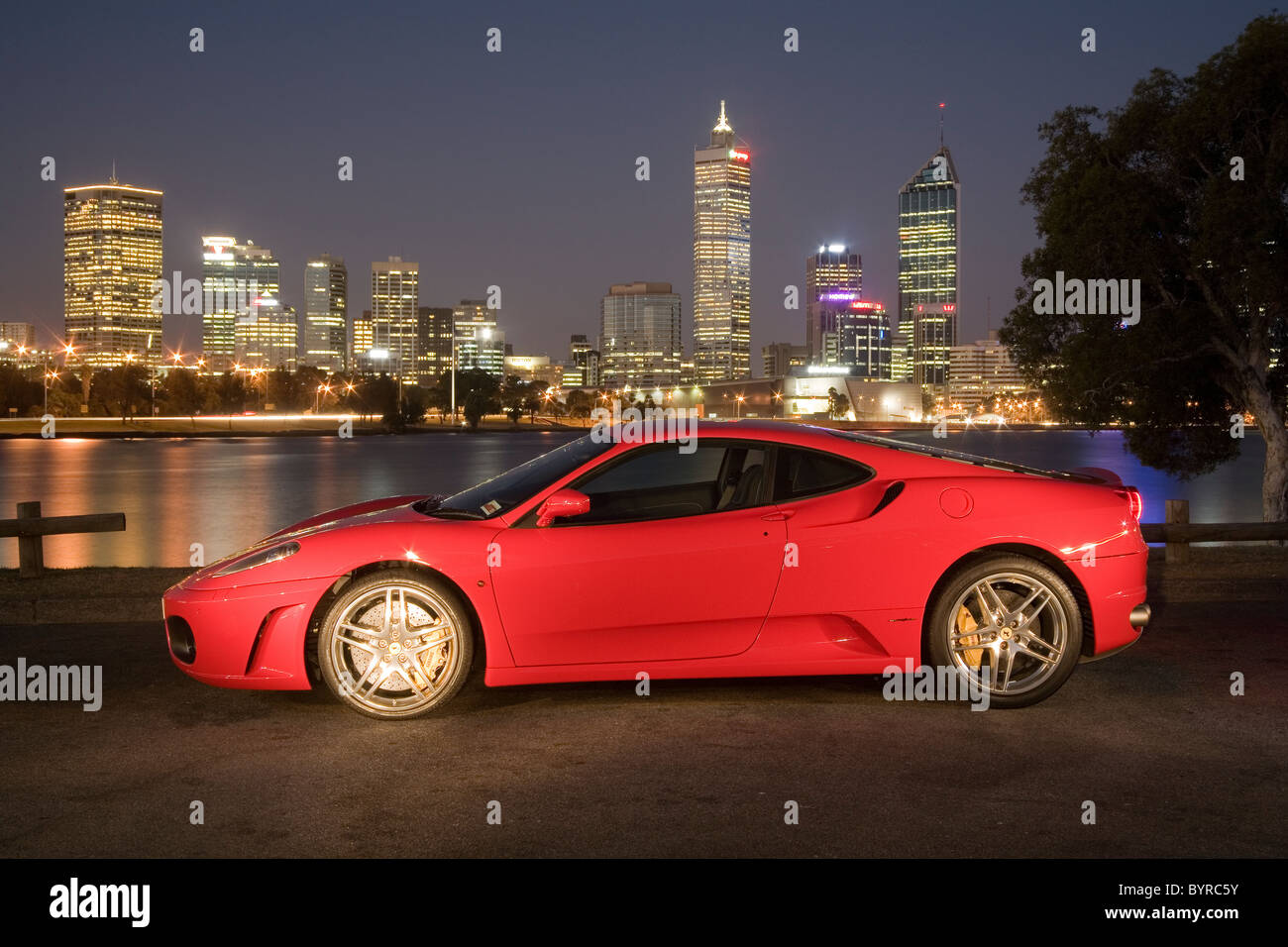 Ferrari F430 sports car sitting beside the Swan river with Perth skyline in  the background, Western Australia Stock Photo - Alamy