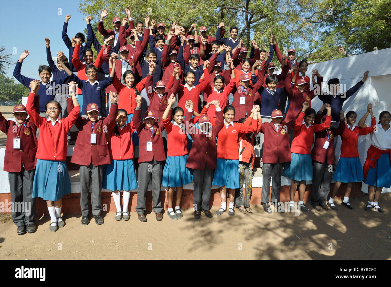 Hands up children hi-res stock photography and images - Alamy