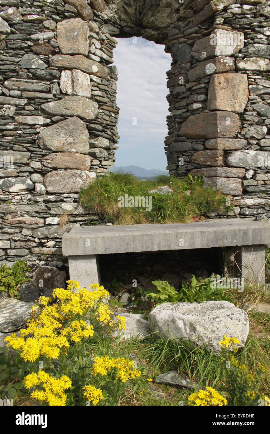 window frame in ruins of st. colman's abbey on inishbofin island off the coast of galway; county galway, ireland Stock Photo