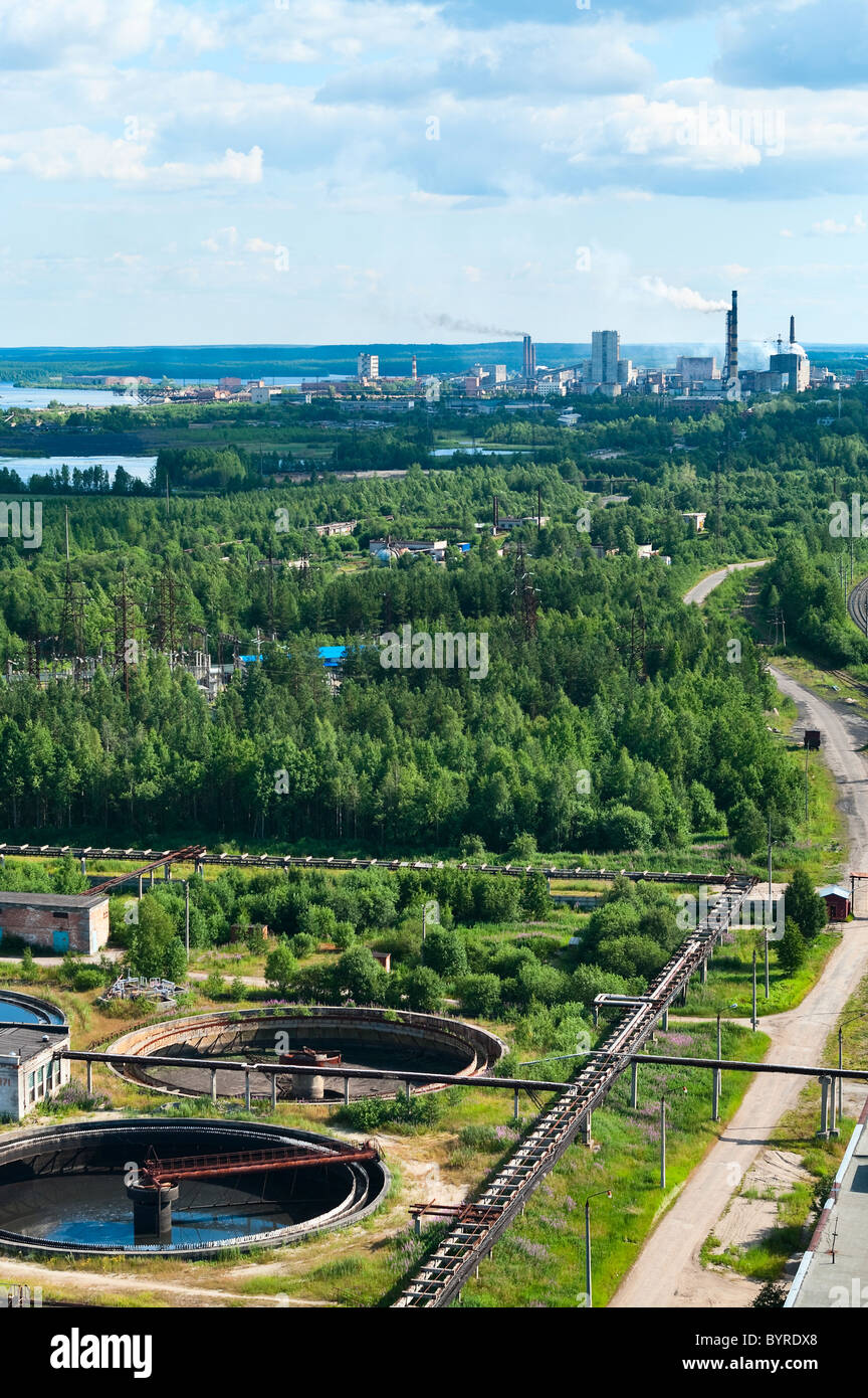 Russian industrial small town Segezha in Karelia, with Pulp and Paper Mill  and its sewage water plant. Summer time. Air view Stock Photo - Alamy