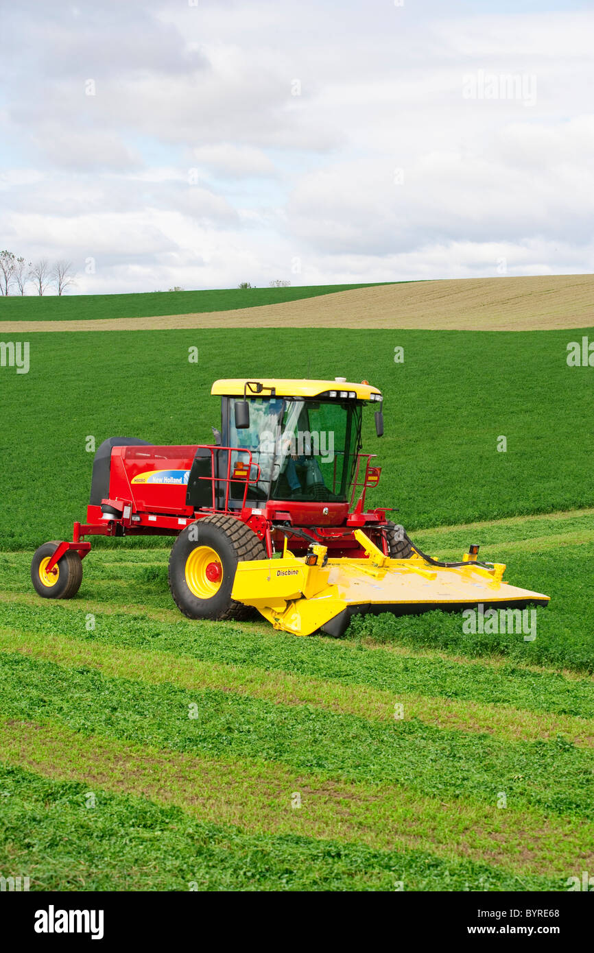 Agriculture A self propelled New Holland Discmower silage harvester