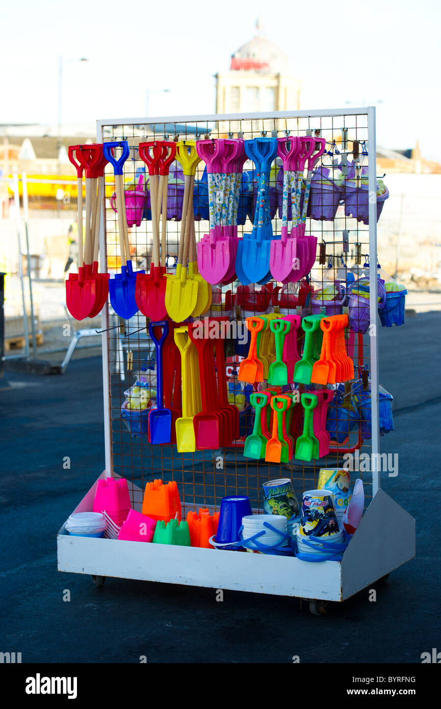 A colourful array of plastic buckets and spades for children to play