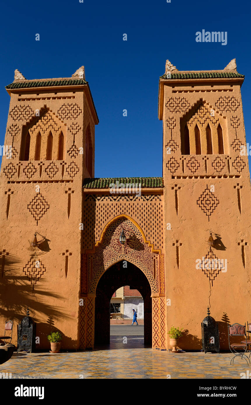 Traditional Berber pise towers made of red adobe and blue sky at desert resort Kasbah Morocco Stock Photo