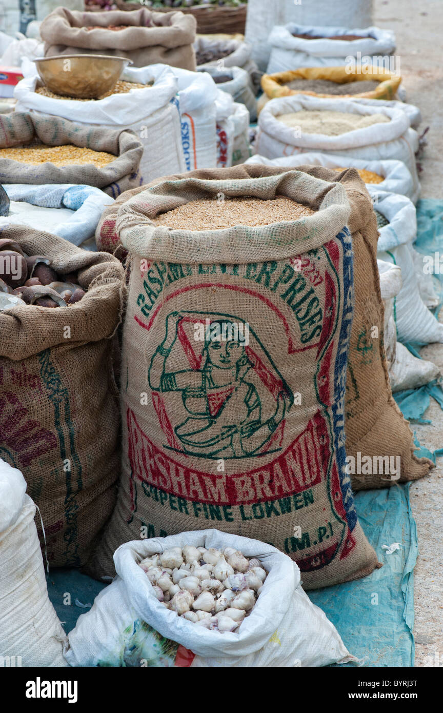 Sacks of wheat grain and dried produce at an indian street market