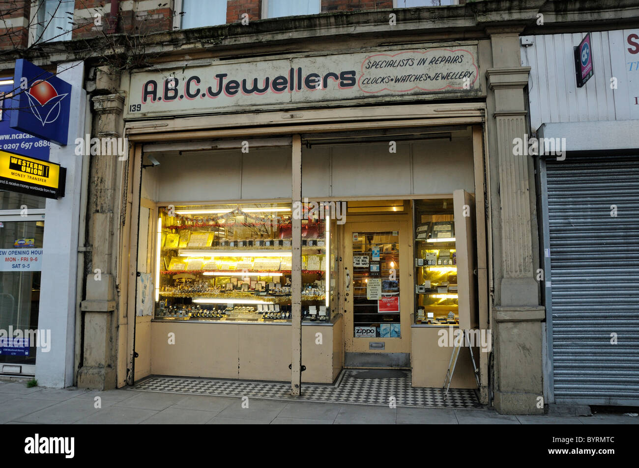 A.B.C. Jewellers old distressed shop front on Holloway Road Islington London England UK Stock Photo