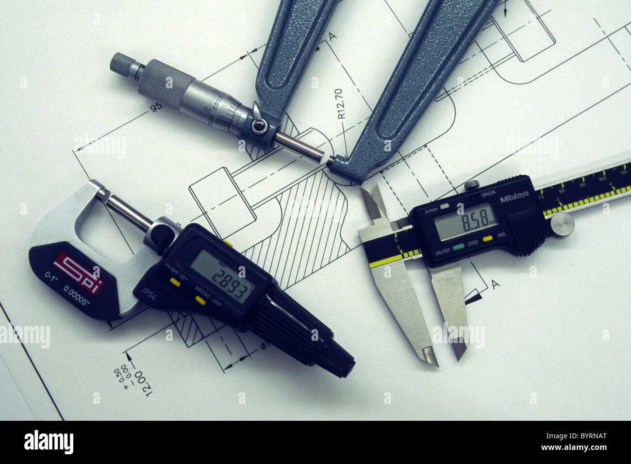 Digital micrometer on engineering drawing hires stock photography and