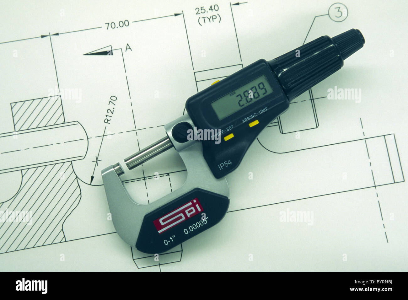 Digital micrometer on engineering drawing hires stock photography and