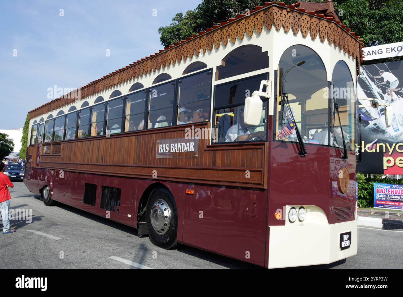 Bus in Kuala Terengganu, Malaysia, custom made in the form of traditional architecture. Stock Photo