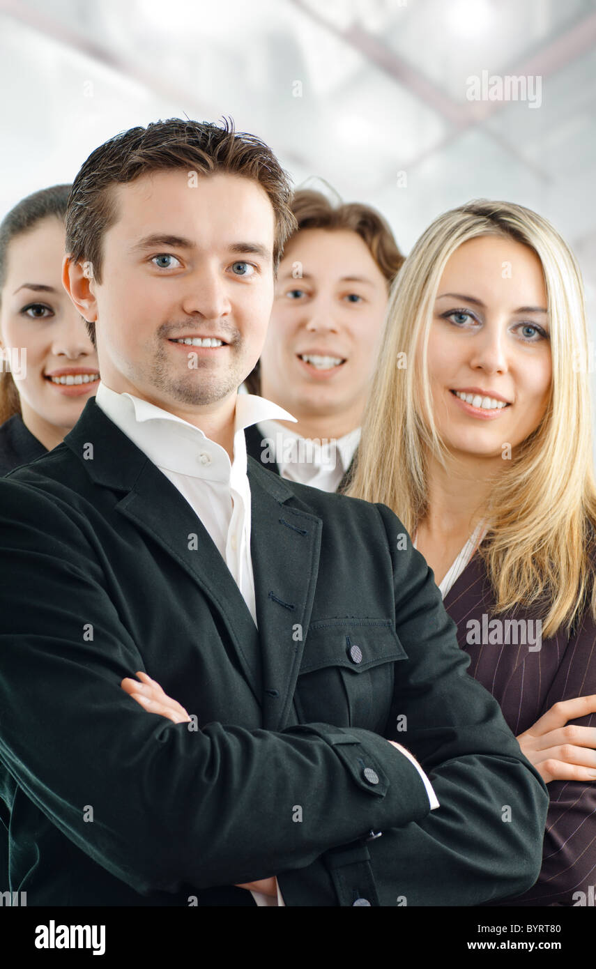 team of successful smiling young business people Stock Photo - Alamy