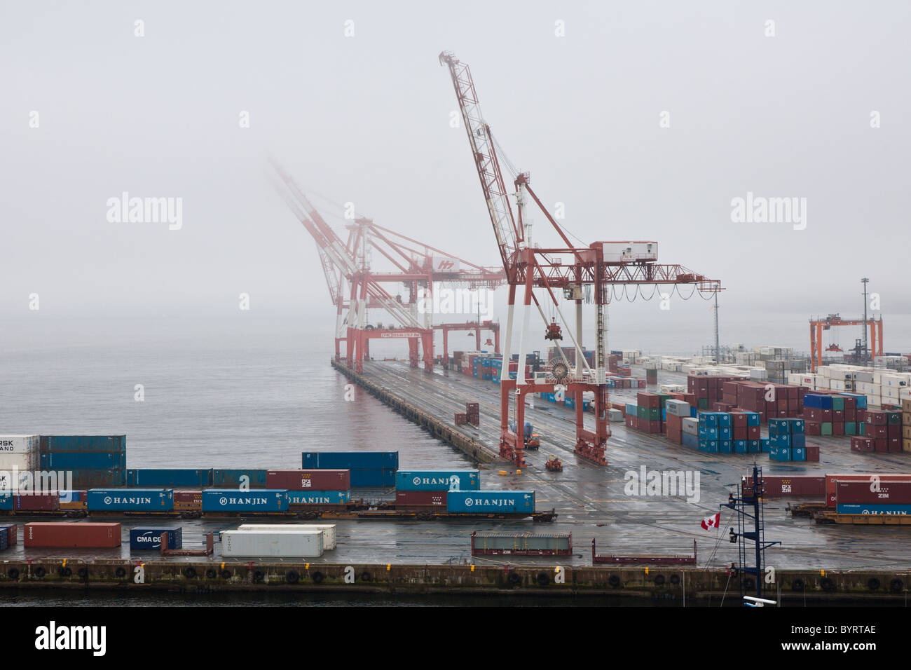 Cargo container rail cars ready for loading at shipping dock in Halifax, Nova Scotia, Canada Stock Photo