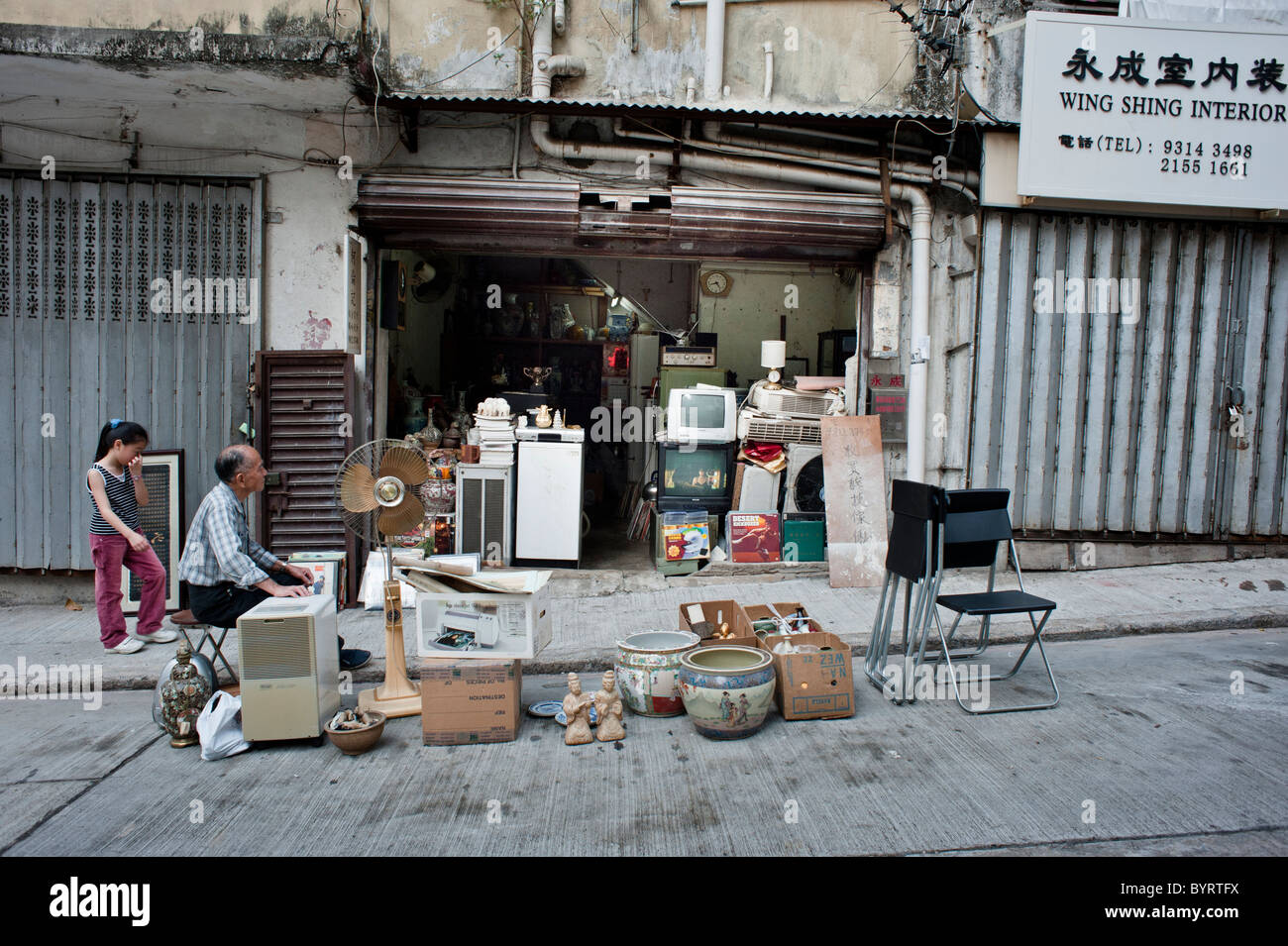 Tai Ping Shan Street street, one of the oldest Chinese neighbourhoods in Hong Kong. Now slowly gentrified. Stock Photo