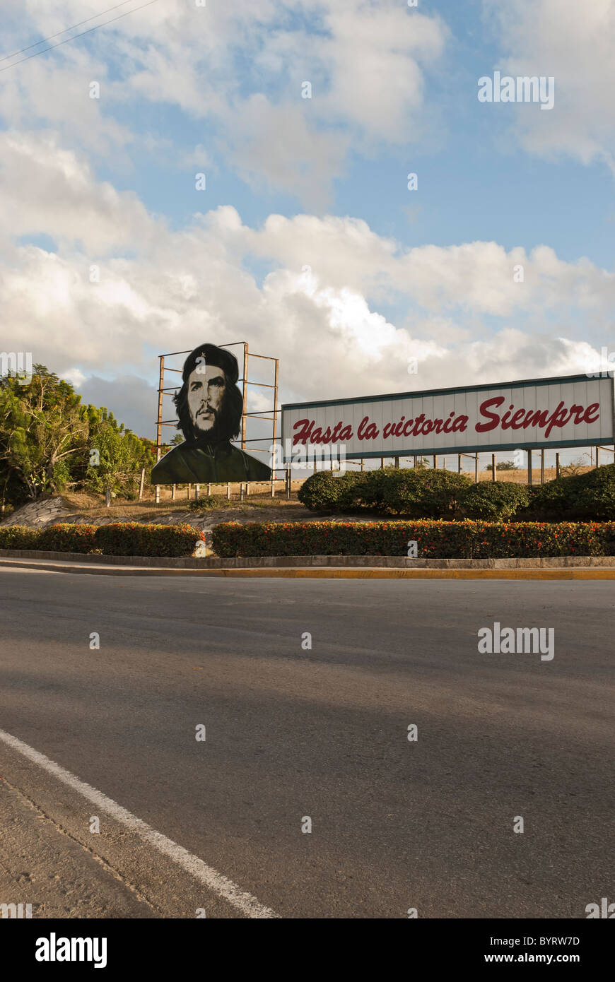 Che propaganda bill on a road near Las Tunas. Las Tunas, Cuba, Caribbean. Stock Photo