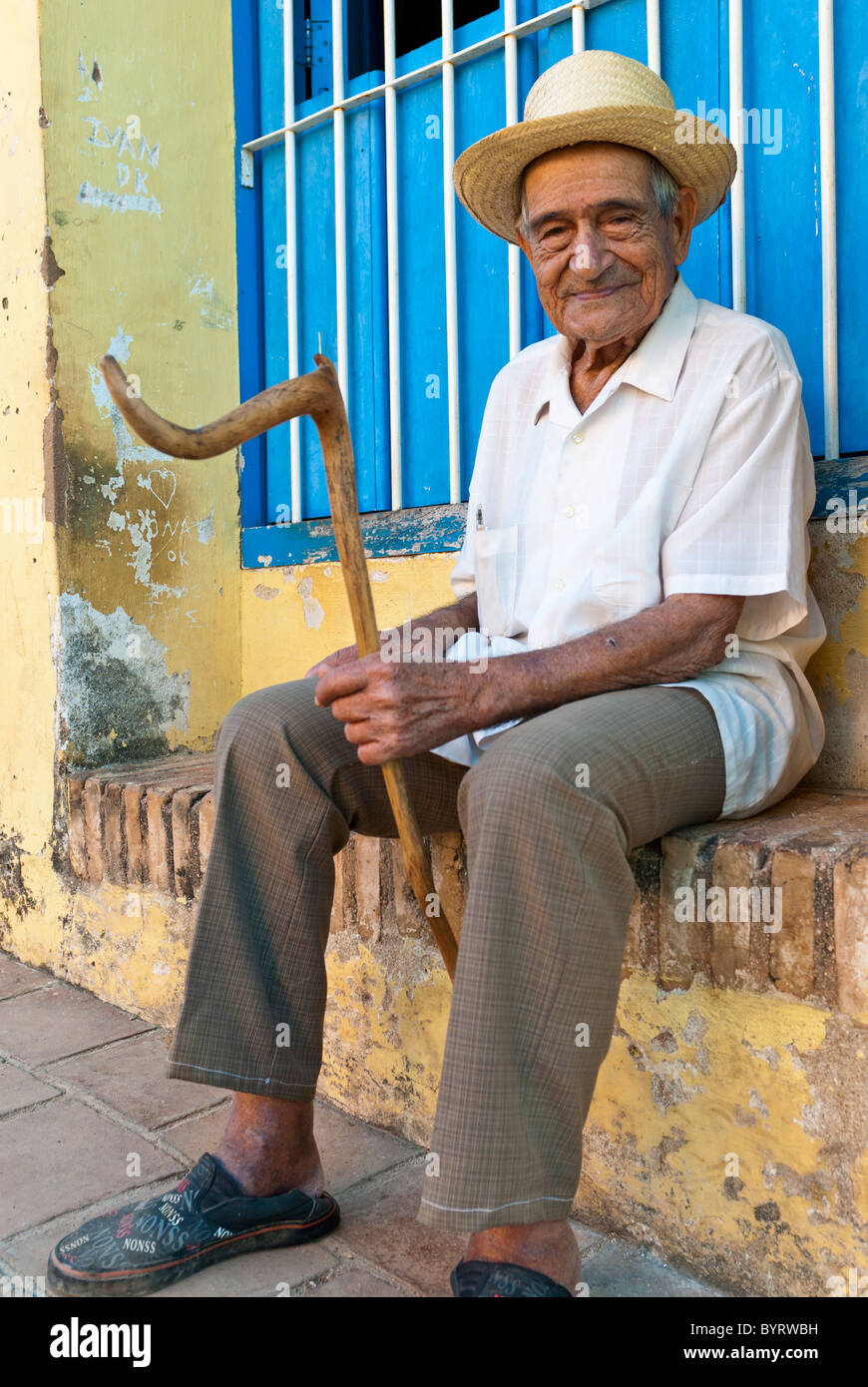 Old man with a walking stick hi-res stock photography and images - Alamy