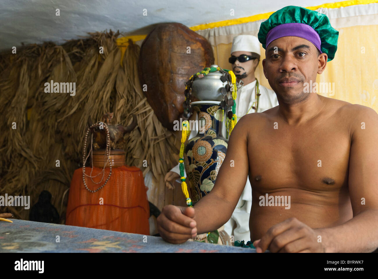 Babalao priest in his house with things needed for his rituals, La Habana, Cuba, Caribbean. Stock Photo
