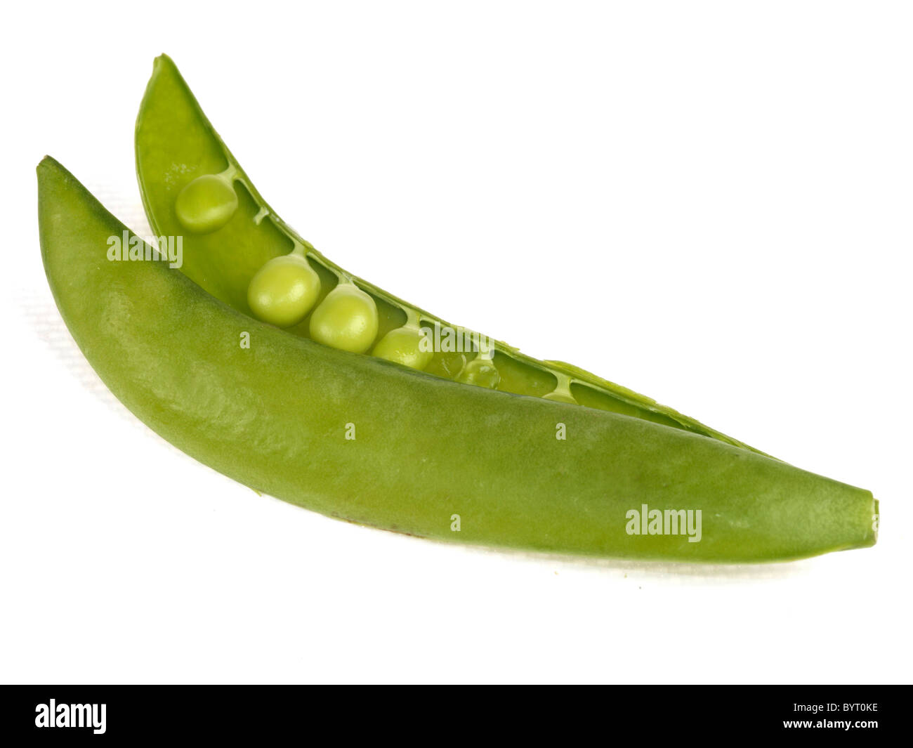 Fresh Ripe Uncooked Raw Garden Green Peas In Pods With No People Against A White Background With A Clipping Path Stock Photo