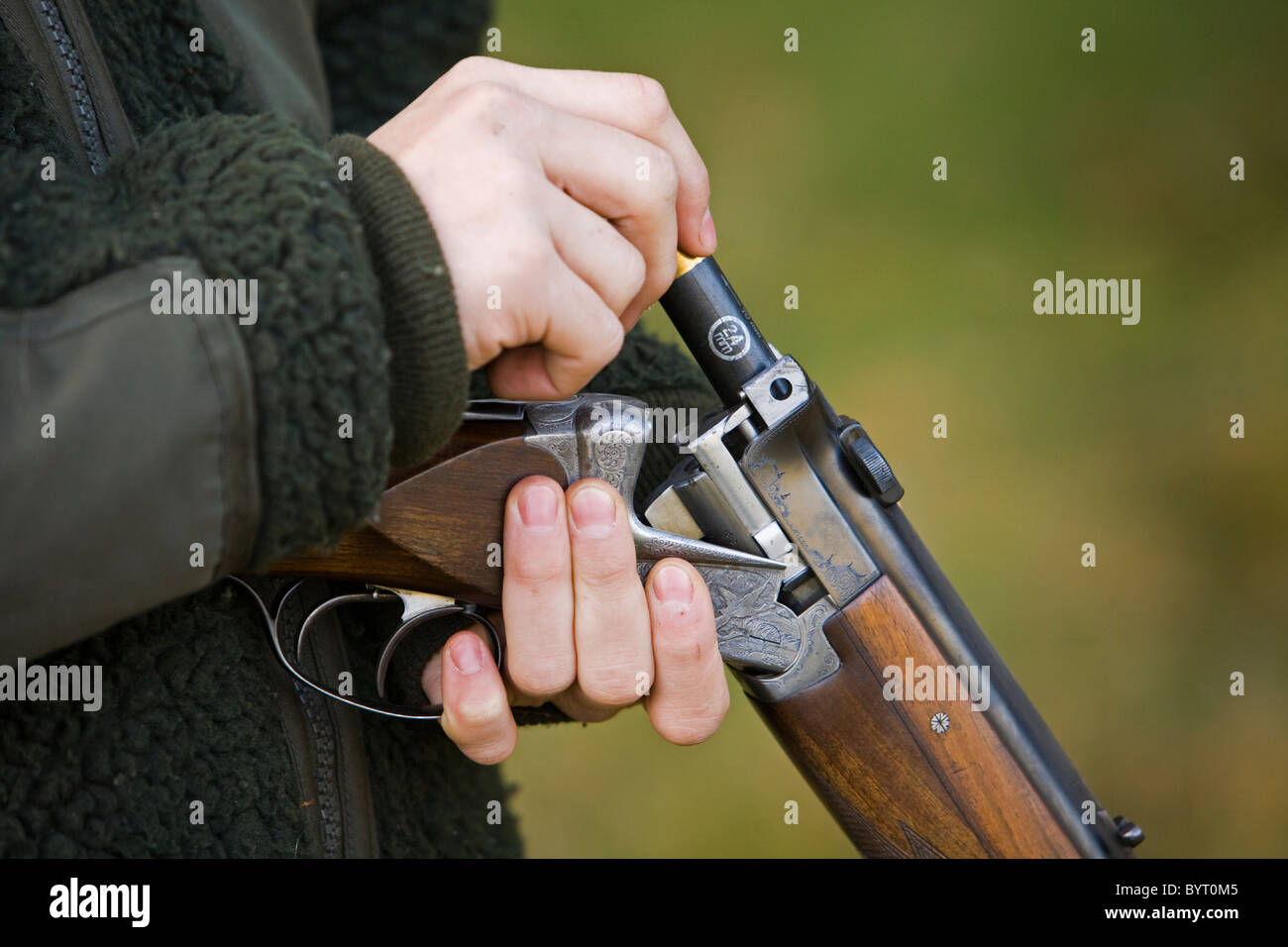 Loading of a gun Stock Photo