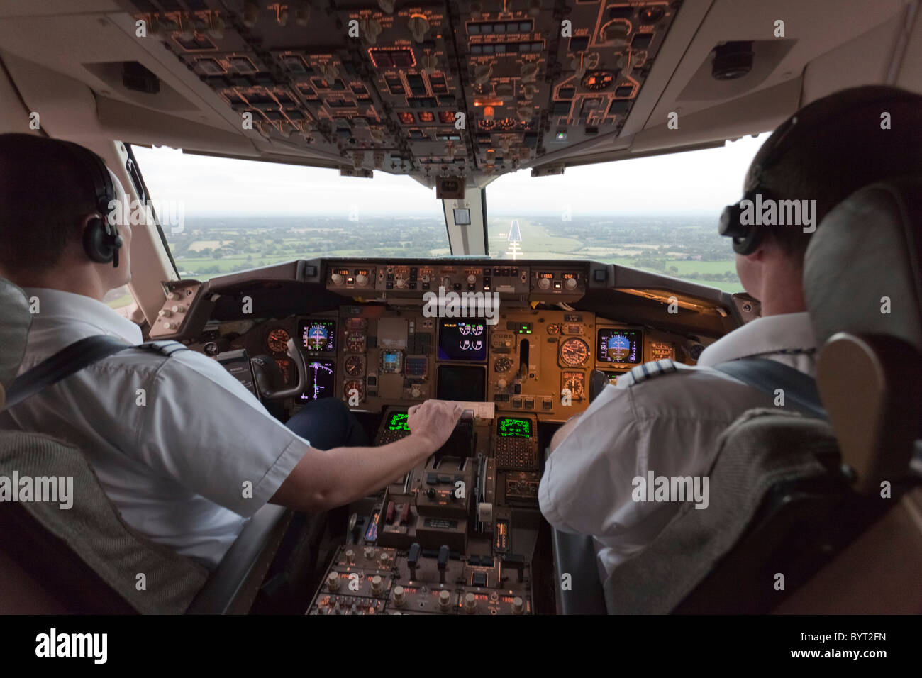 View from Cockpit of a Boeing 767 on approach to Manchester Airport Stock Photo